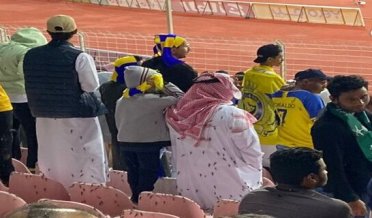 locust attack in Makkah's football stadium