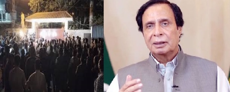 An armored police vehicle broke the door of Parvez Elahi's residence